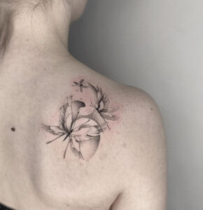 Butterfly tattoo with clean lines on shoulder – Tizio Art