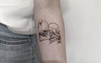 Framed landscape tattoo in minimalist fine line in Antwerp