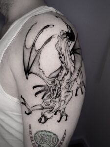 Black ink frog tattoo in abstract flowing style – Tizio Art